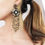 Black and Gold Tassel Drop Earrings - Image 1