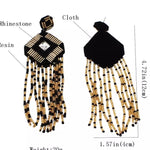 Black and Gold Tassel Drop Earrings - Image 3